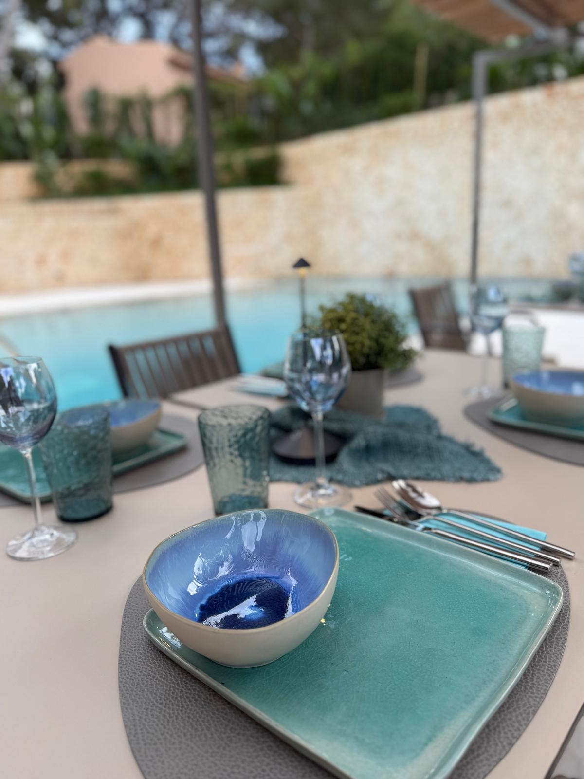 Poolside table set with Mediterranean ceramics